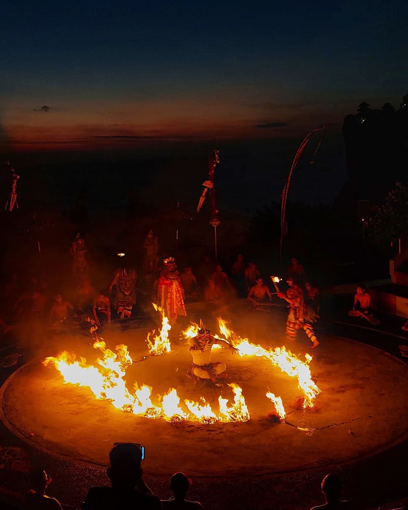 Kecak fire dance performed at dusk in Bali, with Hanuman escaping a ring of flames